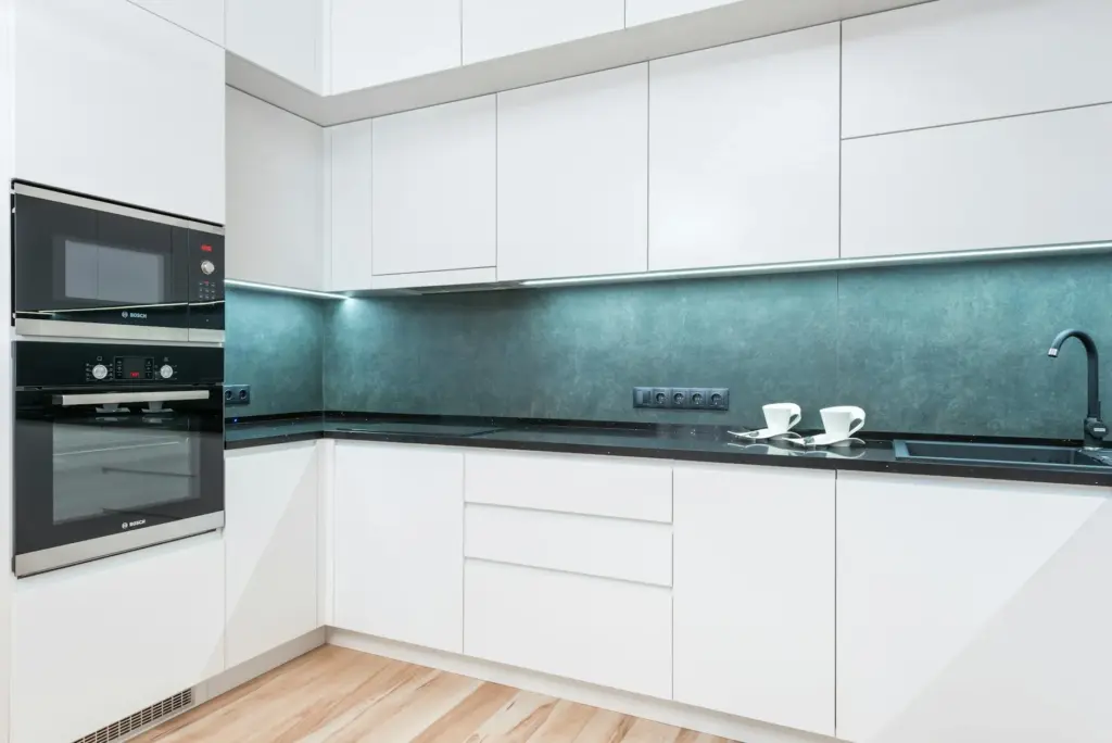 Bright, clean kitchen with modern design and built-in appliances for a contemporary home.