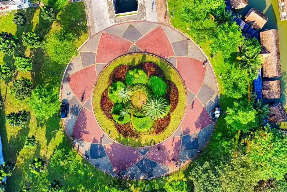 Stunning aerial shot of a colorful circular garden in Banten, Indonesia, surrounded by lush greenery.