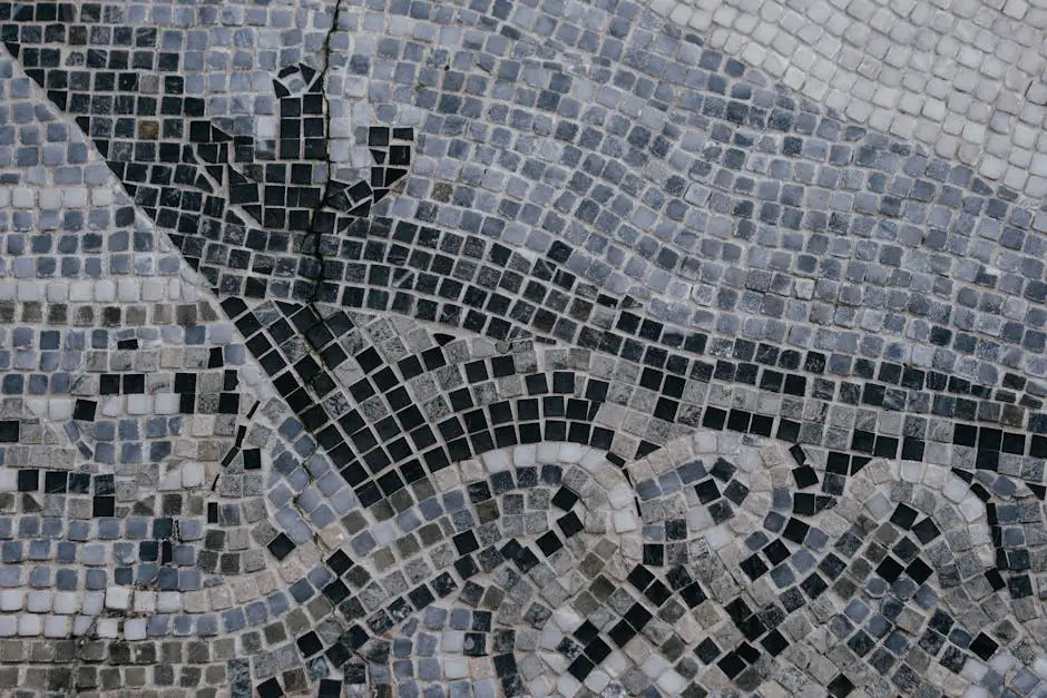 Intricate stone mosaic pattern with abstract design captured in close-up view.