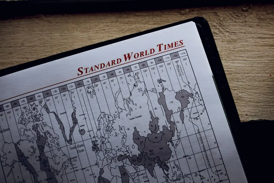 Close-up view of a world time zone map printed on paper inside a diary.