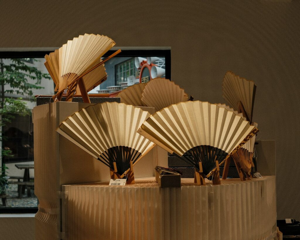 A group of fans sitting on top of a table
