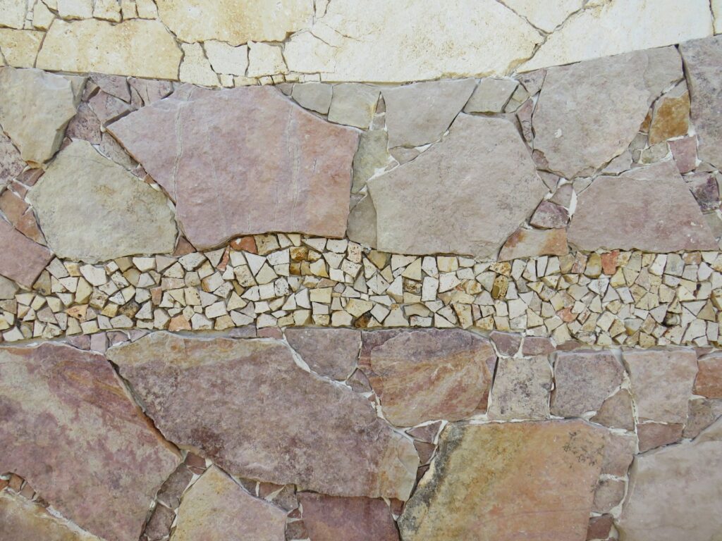 a close up of a wall made of rocks