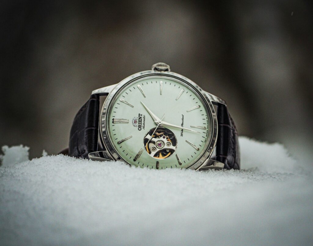 a watch that is sitting in the snow