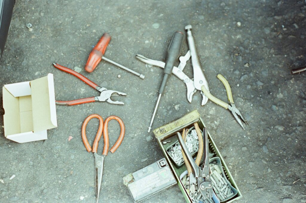 a group of tools lay on the ground