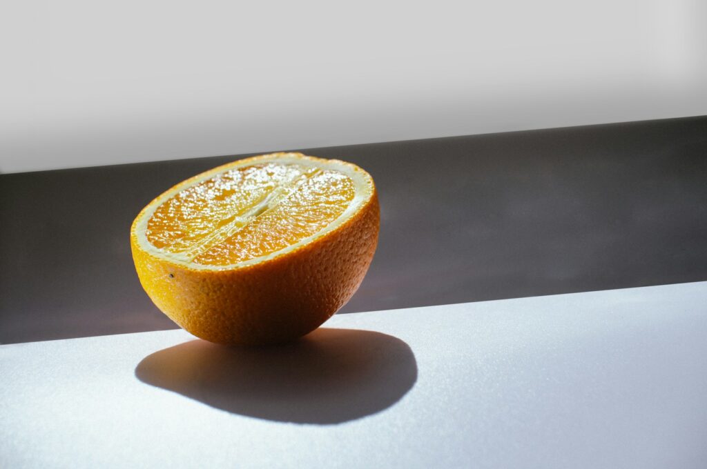 a close up of an orange on a table