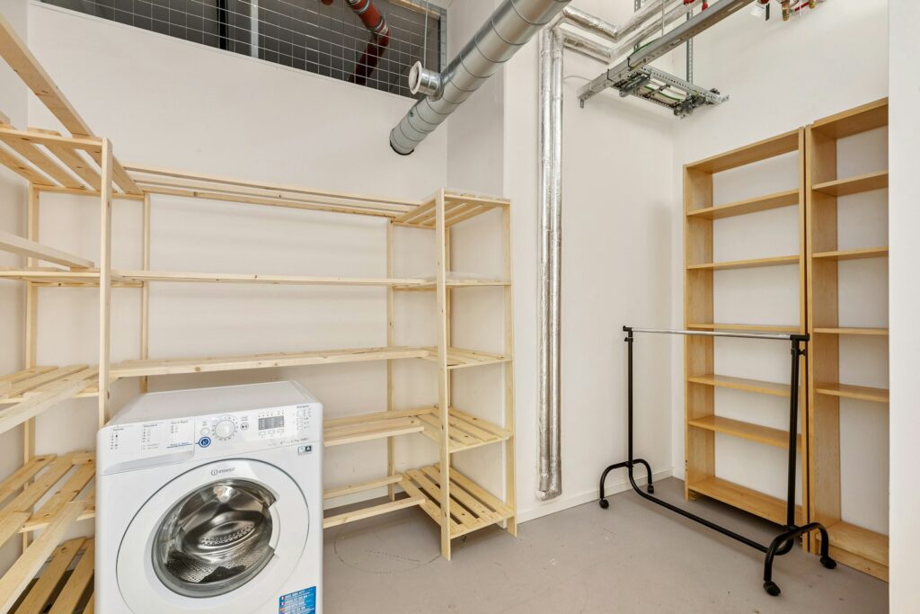 A laundry room with a washer and dryer