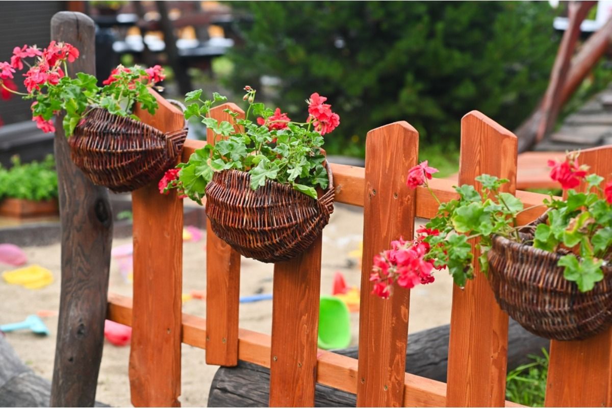 Some Homeowners Are Painting Garden Fences Bright Colors to Match Their Plants, And Neighbors Are Divided Over Whether It Looks Creative or Distracting