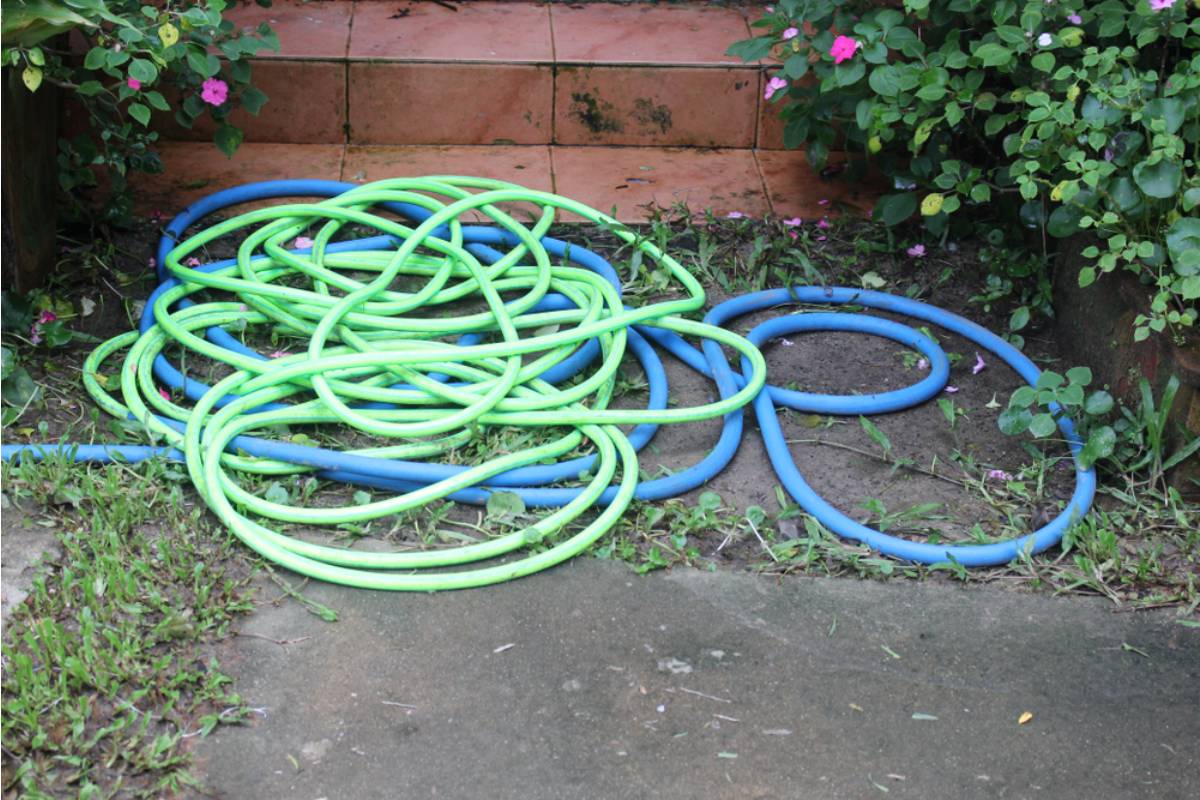 Gardener Says She Left Her Garden Hose Coiled by the Spigot for Neighbors to Use, Now Someone Keeps Leaving It Running for Hours and Her Water Bill Has Doubled