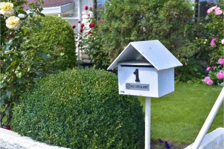 Gardener Says a Neighbor's Moving Truck Crushed Her Mailbox Garden Bed While Trying to Maneuver Into the Driveway Next Door
