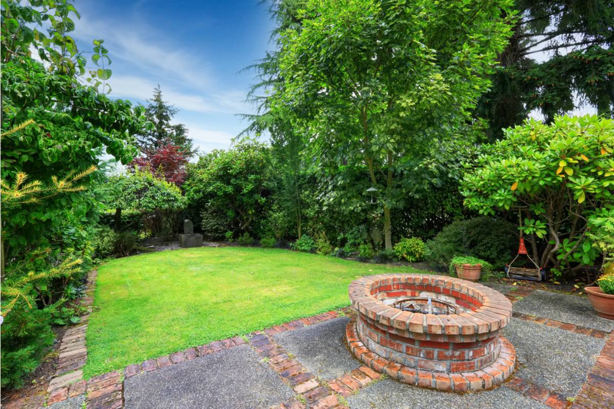 Homeowner Says His Neighbor's New Above-Ground Fire Pit Sits Just Feet From His Wooden Garden Beds, Now He's Worried About More Than Just Smoke Damage