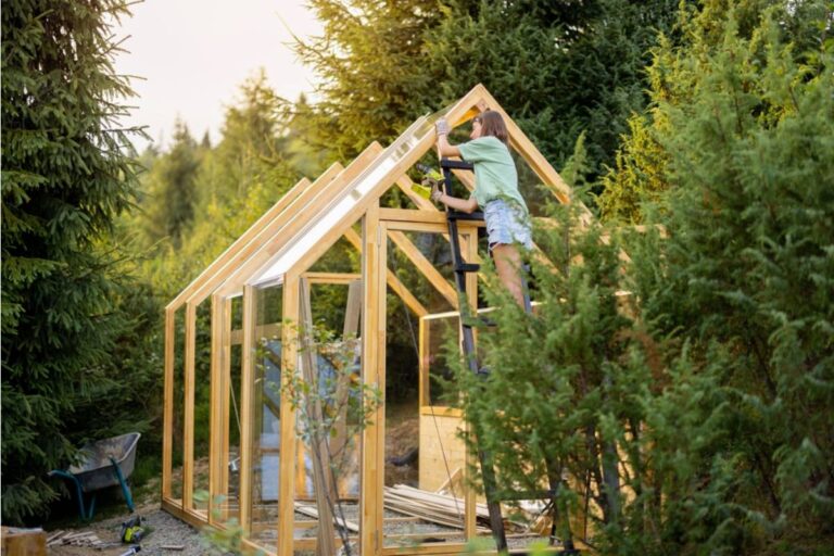 Homeowner Says His Neighbor Watched Him Struggle to Carry a New Greenhouse Frame Alone for an Hour, Then Asked if She Could Use It to Store Her Holiday Decorations Once It Was Built