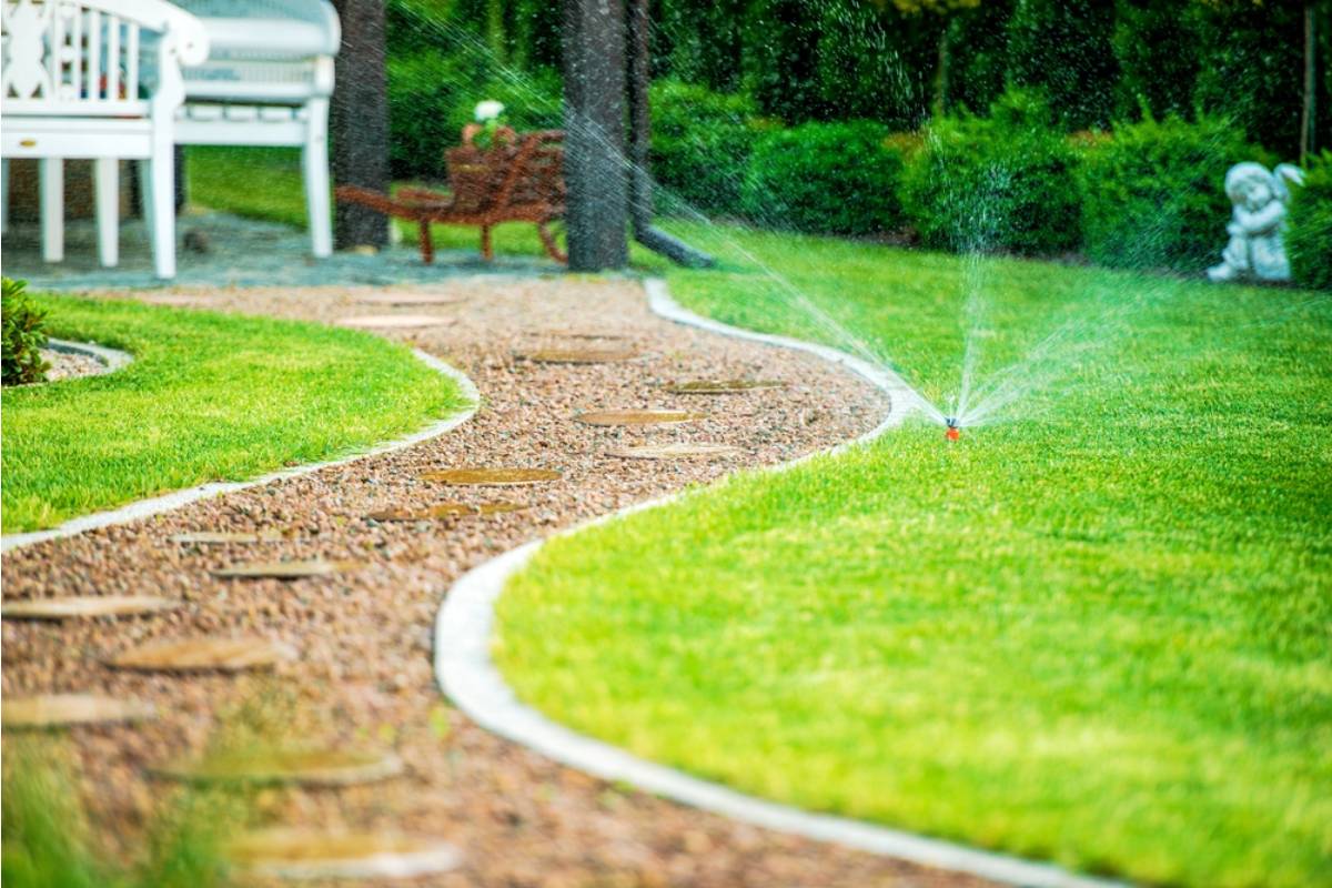 Gardener Says She Spent Years Perfecting a Garden Path Made From Hand-Painted Stepping Stones Her Kids Made as Children, Then Her Neighbor's Movers Cracked Half of Them and Offered to "Buy New Ones From a Store"