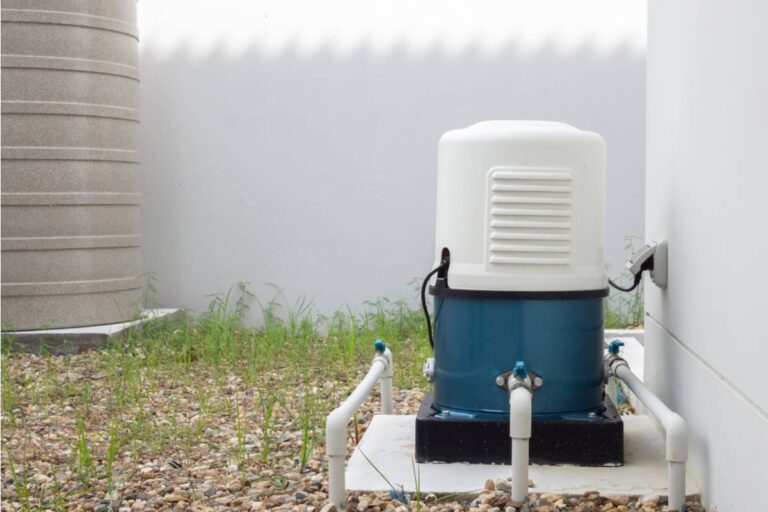 Homeowner Says a Neighbor's New Above-Ground Water Softener System Drains Salt Water Directly Into the Corner of Her Garden