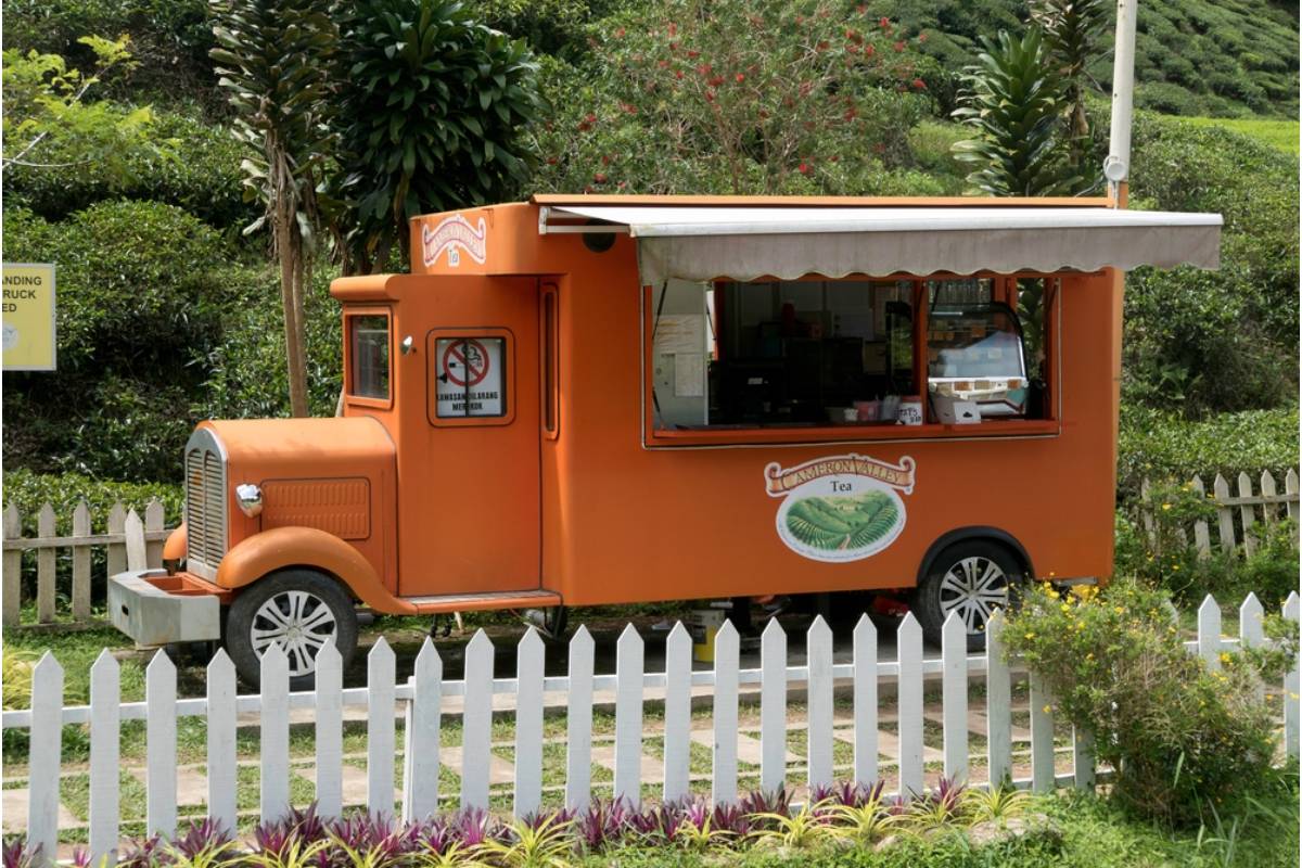 Homeowner Says a Neighbor's Weekend Food Truck Business Parks Directly Beside Her Garden, Leaving Grease Stains on the Fence Line Every Time