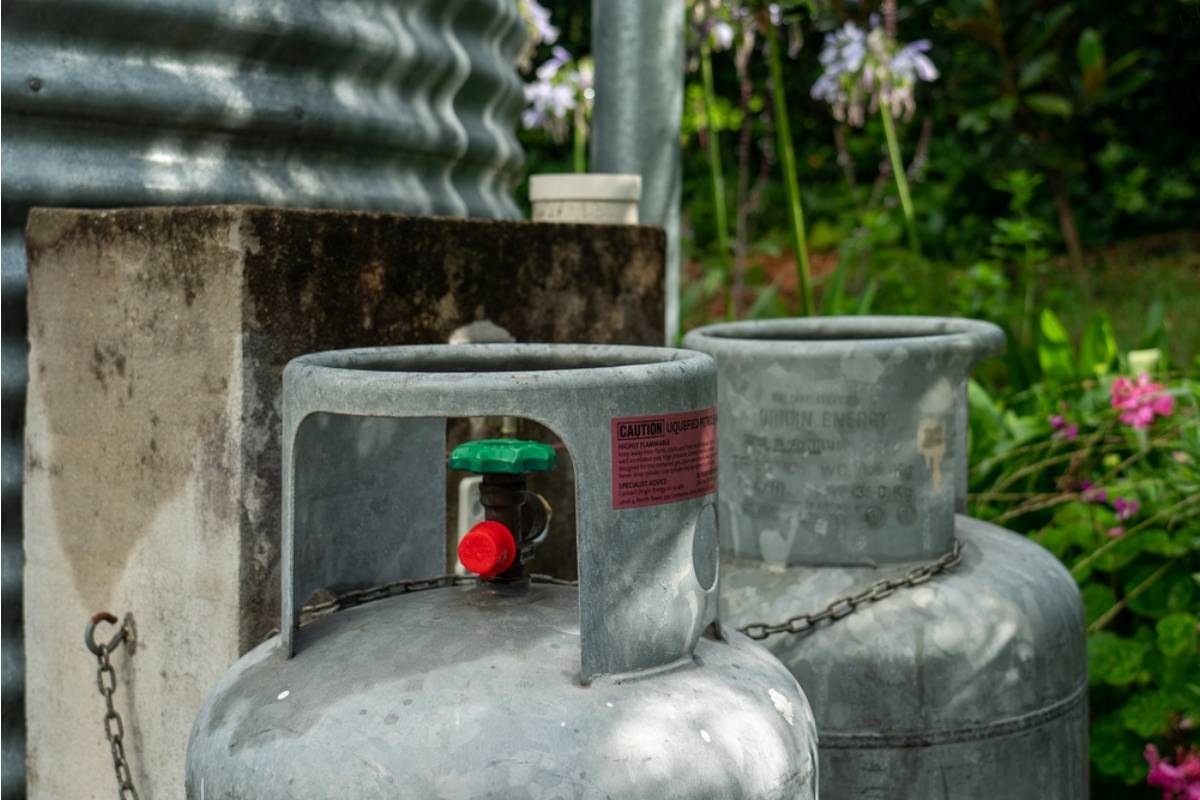 Homeowner Says a Neighbor's New Above-Ground Propane Tank Was Installed Close Enough to Scorch Half His Vegetable Bed During a Refill