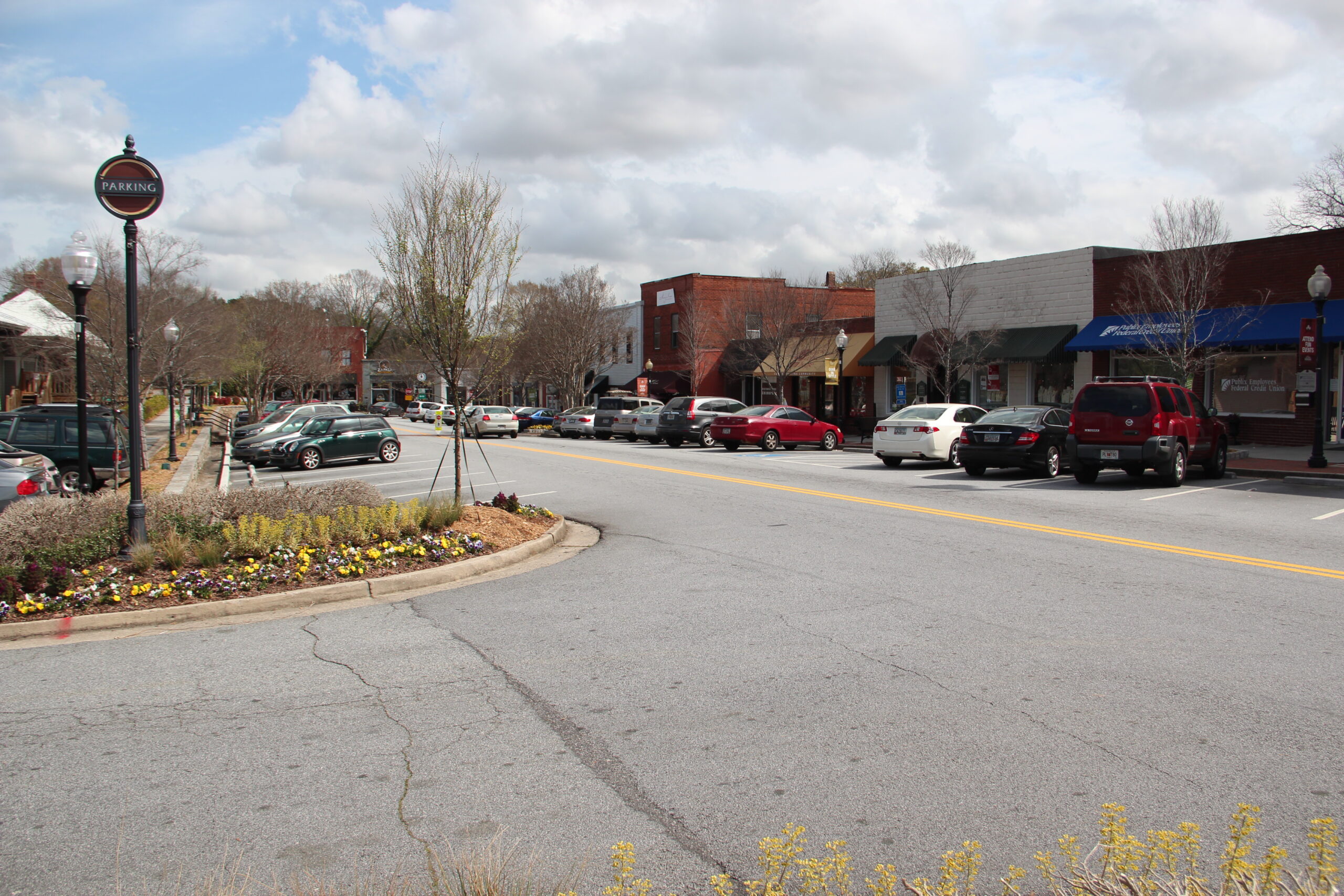 Downtown Norcross, Georgia, with shops and trees along the street