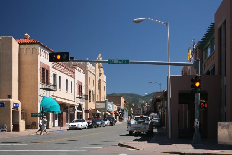Low adobe-style buildings and trees in Santa Fe, New Mexico